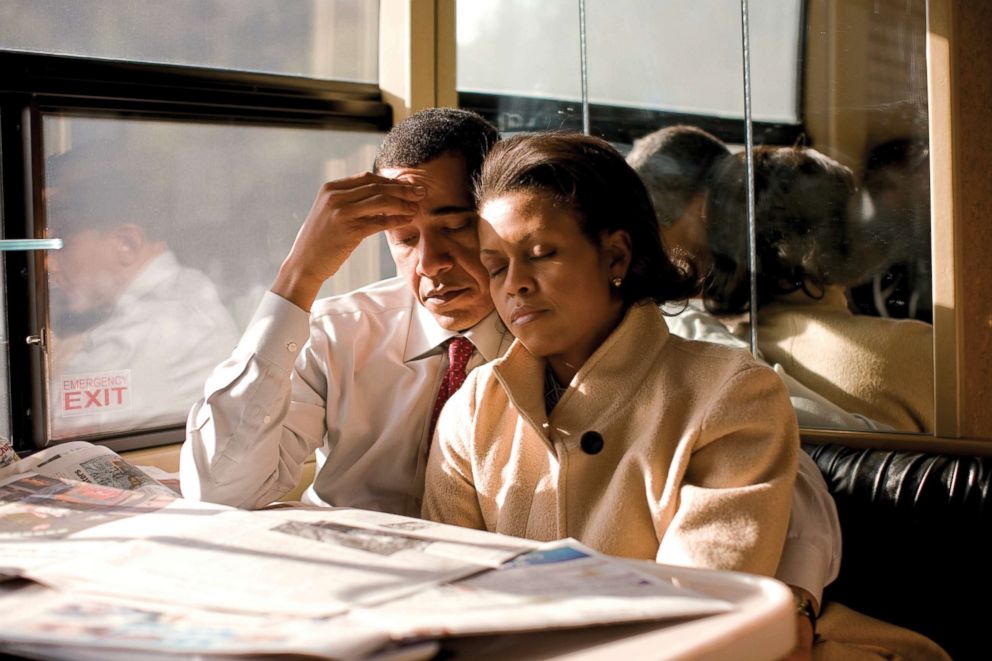 PHOTO: Michelle Obama and her husband, Senator and Presidential Candidate Barack Obama, on his campaign bus the morning of the New Hampshire primary driving from Hanover to Nashua, N.H. They had a early morning rally after a late night of campaigning.