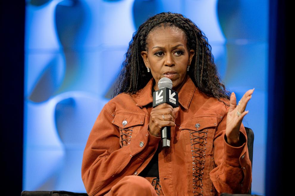 PHOTO: Michelle Obama speaks on stage during IMO Live podcast 2025 SXSW Conference and Festival at Austin Convention Center, on March 13, 2025, in Austin, Texas. 