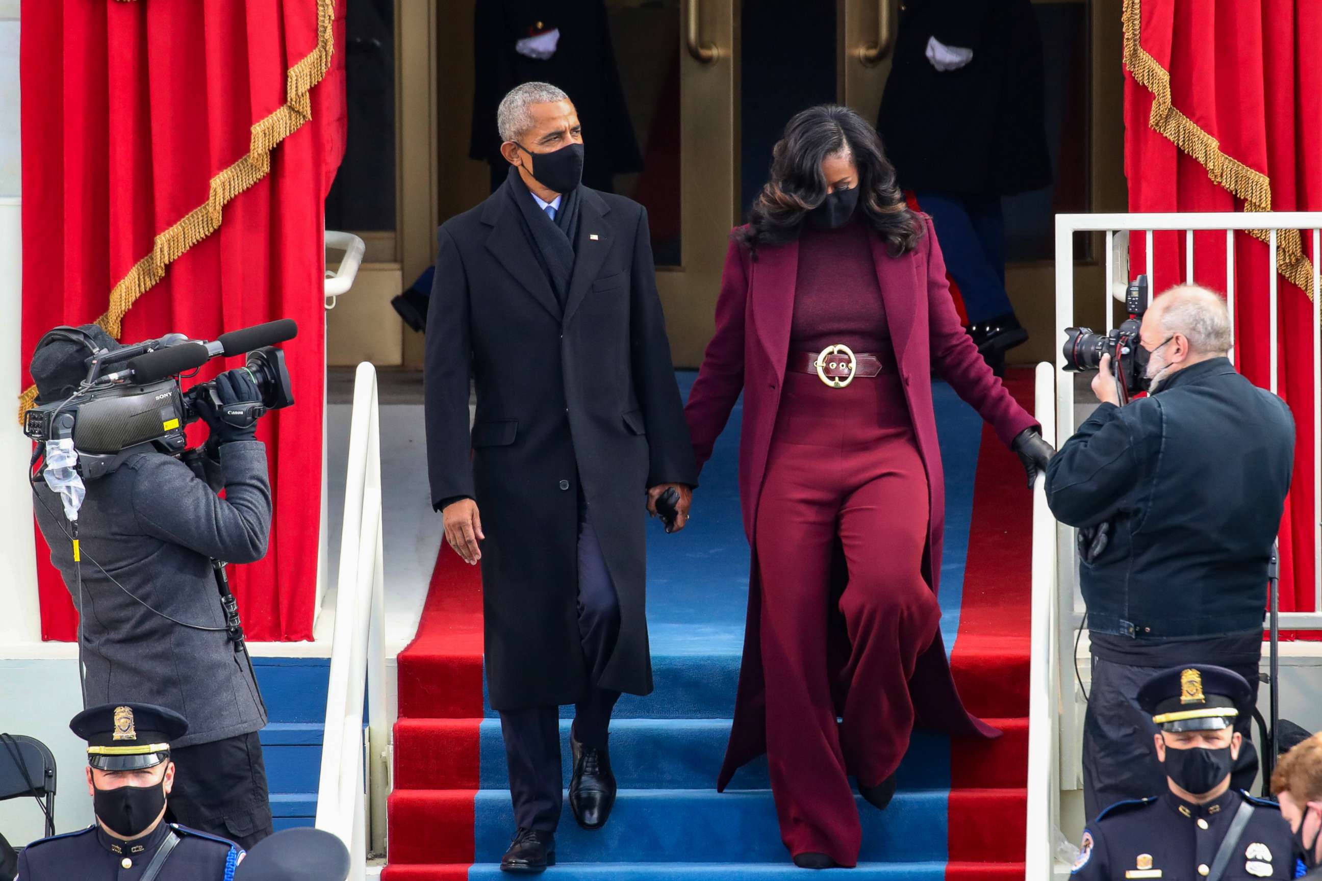 PHOTO: Former President Barack Obama and former first lady Michelle Obama arrive to the inauguration of President-elect Joe Biden on the West Front of the U.S. Capitol on Jan. 20, 2021, in Washington, D.C.