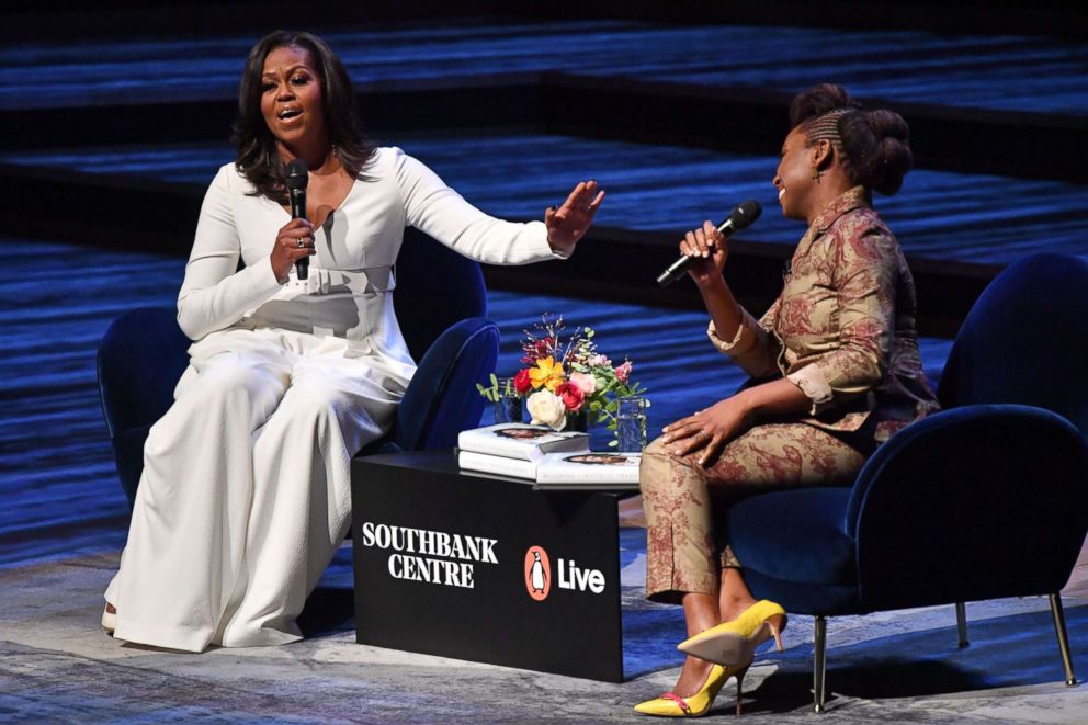 PHOTO: Former first lady Michelle Obama speaks with Nigerian novelist Chimamanda Ngozi Adichie at the Royal Festival Hall in London on Dec. 3, 2018.