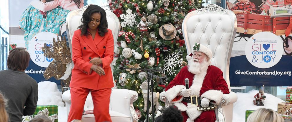 photo former first lady michelle obama dances after a patient at childrens hospital colorado in - fortnite orange justice dance