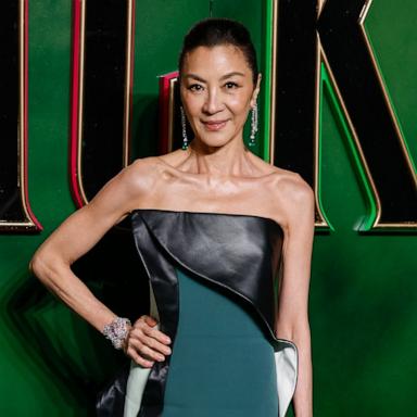 PHOTO: Michelle Yeoh poses for photographers upon arrival at the premiere of the film 'Wicked.,' Nov. 18, 2024, in London. 