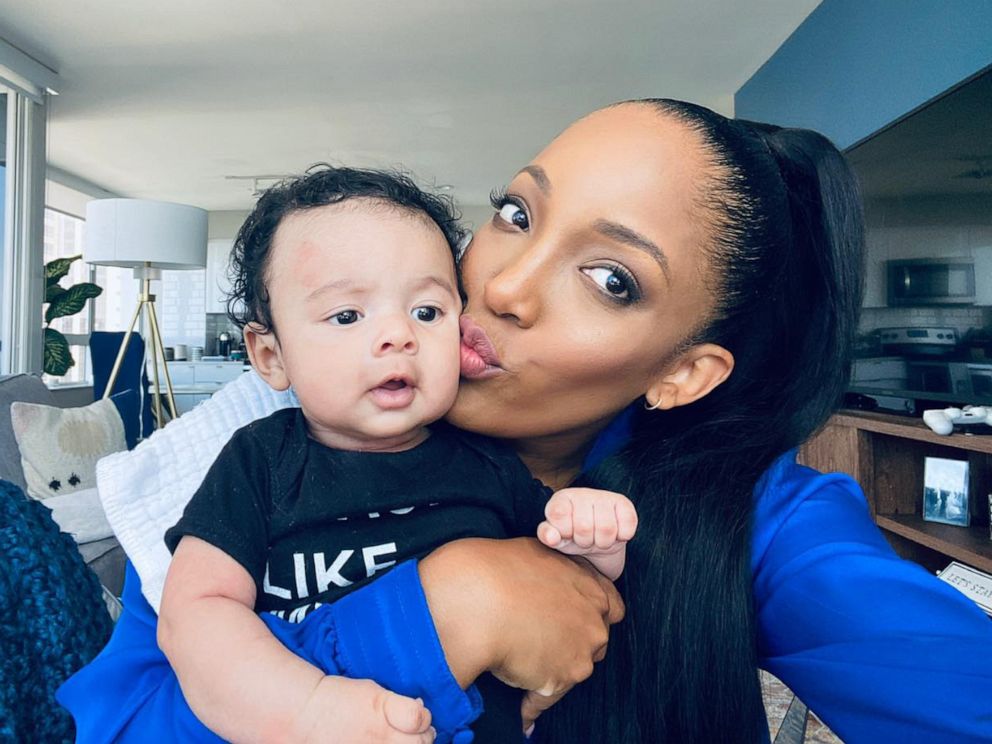 PHOTO: Country singer Mickey Guyton poses for a photo with her son, Grayson.