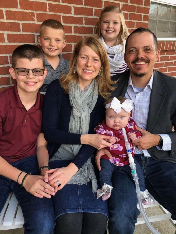 PHOTO: Amber and JP Day of Columbia, Missouri, pose in 2019 with their four children. Joy Day, now 10 months, was born a micro preemie.
