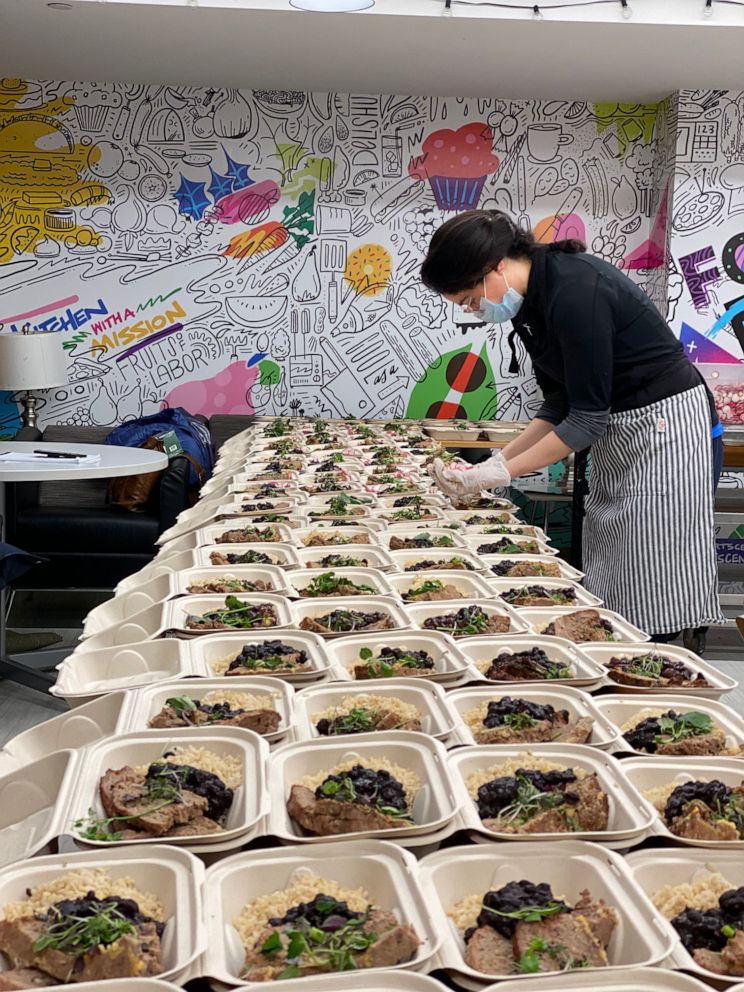 PHOTO: Volunteers help assemble meals for food-insecure voters with The Migrant Kitchen for the Feed the Polls initiative.