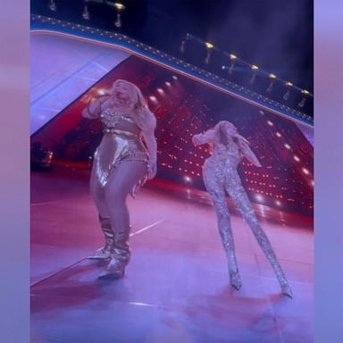 PHOTO: Beyoncé and Miley Cyrus are seen on a video screen as they perform together in Paris, France, on June 19, 2025, during the "Cowboy Carter" tour.