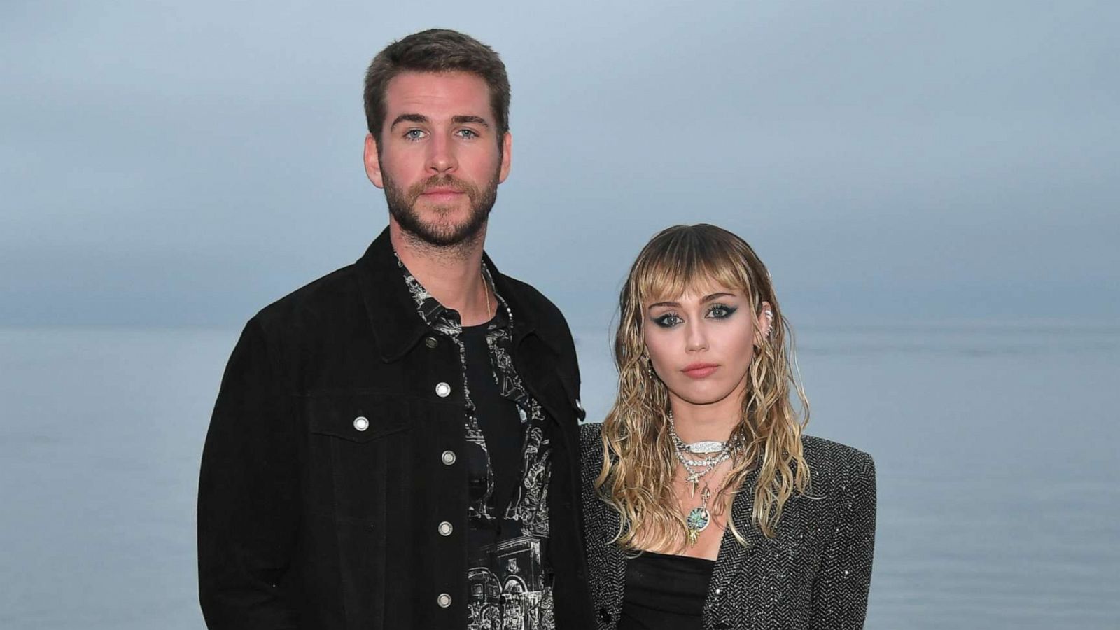 PHOTO: Liam Hemsworth and Miley Cyrus attend the Saint Laurent Mens Spring Summer 20 Show Photo Call, June 6, 2019, in Malibu, Calif.