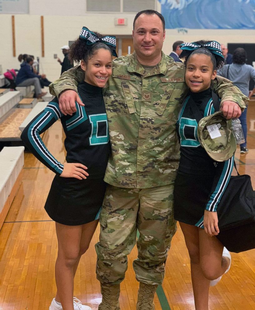 PHOTO: Zoe and A'nina Pasco were surprised by their dad, Technical Sgt. Anthony Pasco of the U.S. Air Force, on Dec. 17, 2018.