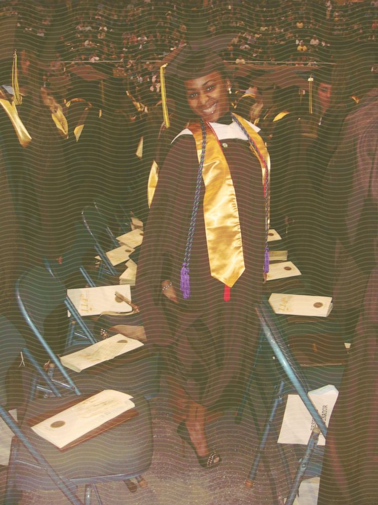 PHOTO: Melissa Jean-Baptiste stands before walking onto the stage to get her diploma during her college graduation in 2010.