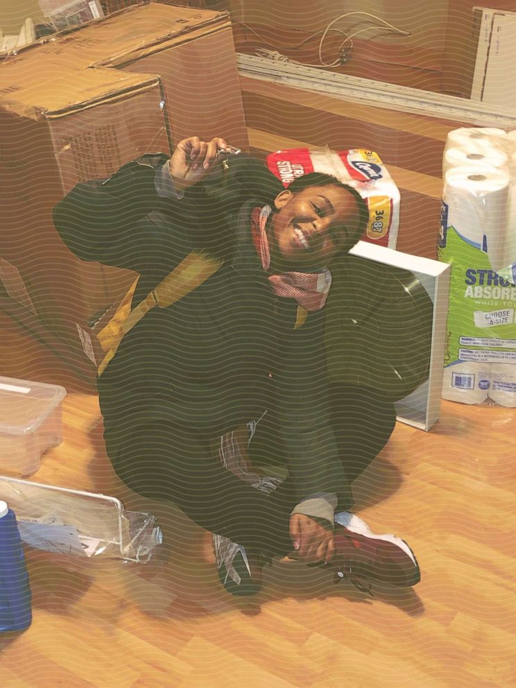 PHOTO: Melissa Jean-Baptiste sits on the floor of her new home with keys in hand the same day she closed on her house in January 2019.