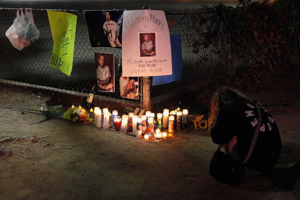 PHOTO: Fans gather at makeshift memorial for late rapper Mac Miller at the corner of Fairfax and Melrose Avenues, Sept. 8, 2018, in Los Angeles.