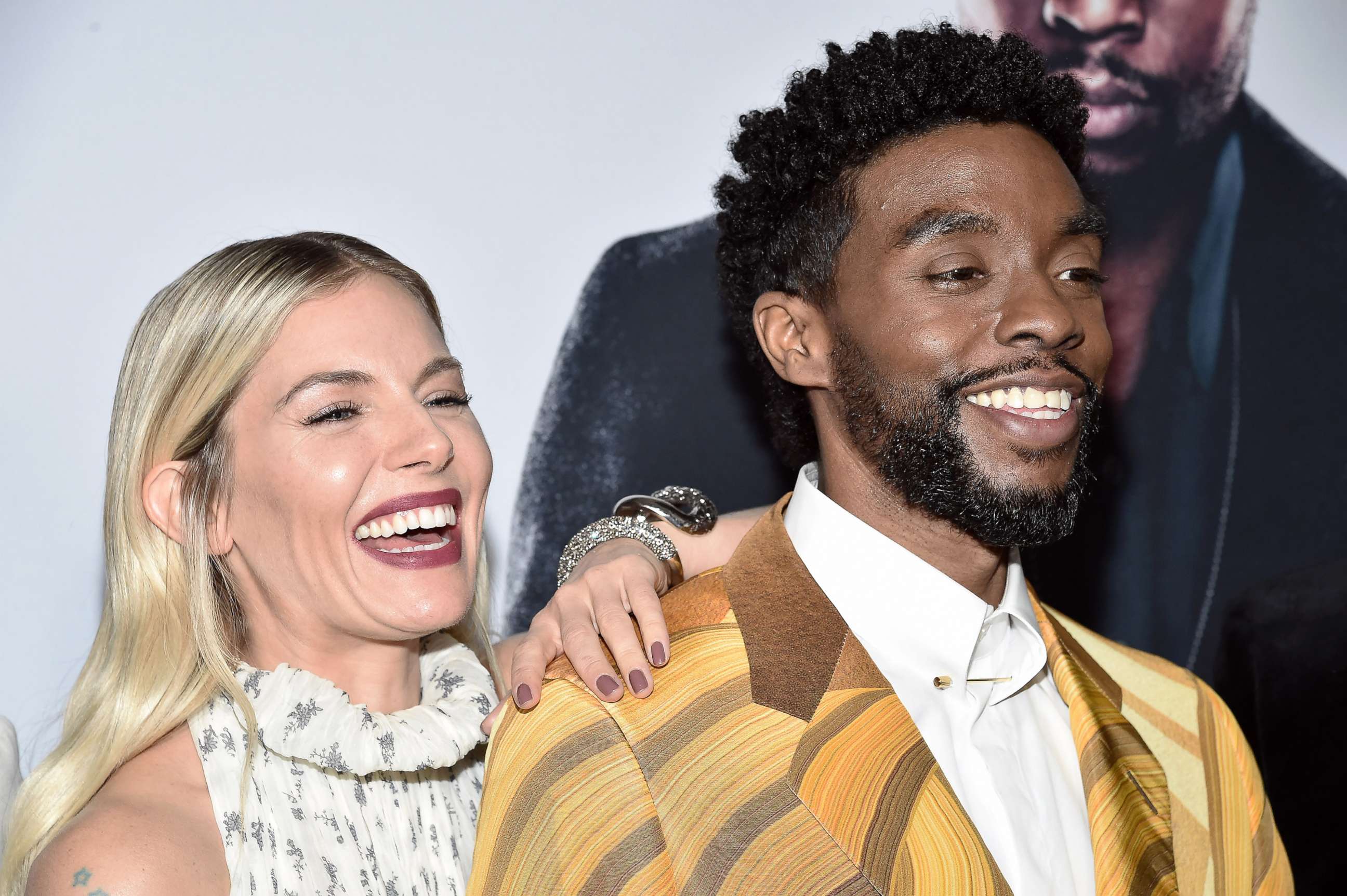 PHOTO: Sienna Miller and Chadwick Boseman attend the "21 Bridges" screening in New York City, Nov. 19, 2019.