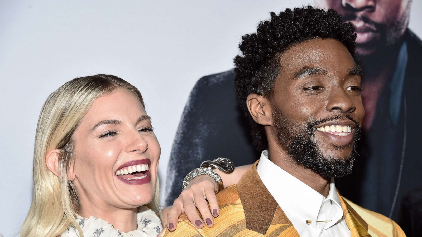 PHOTO: Sienna Miller and Chadwick Boseman attend the "21 Bridges" screening in New York City, Nov. 19, 2019.