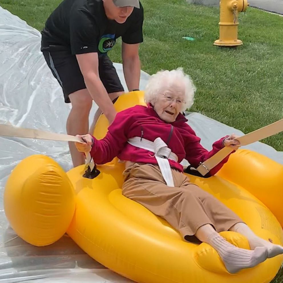 VIDEO: Senior citizens slip and slide into the summer in viral video 