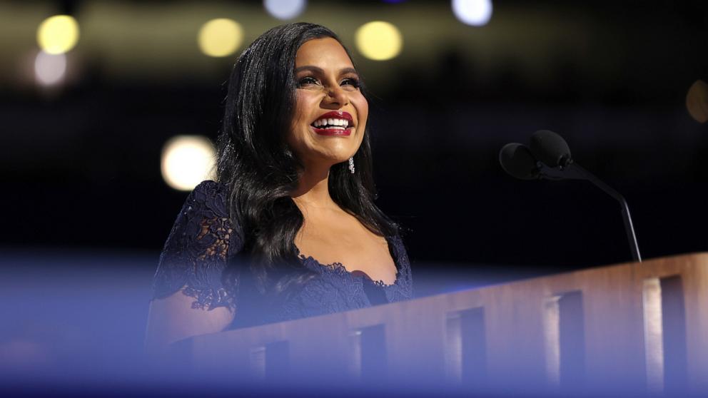 PHOTO: Mindy Kaling speaks on stage during the third day of the Democratic National Convention, Aug. 21, 2024, in Chicago.