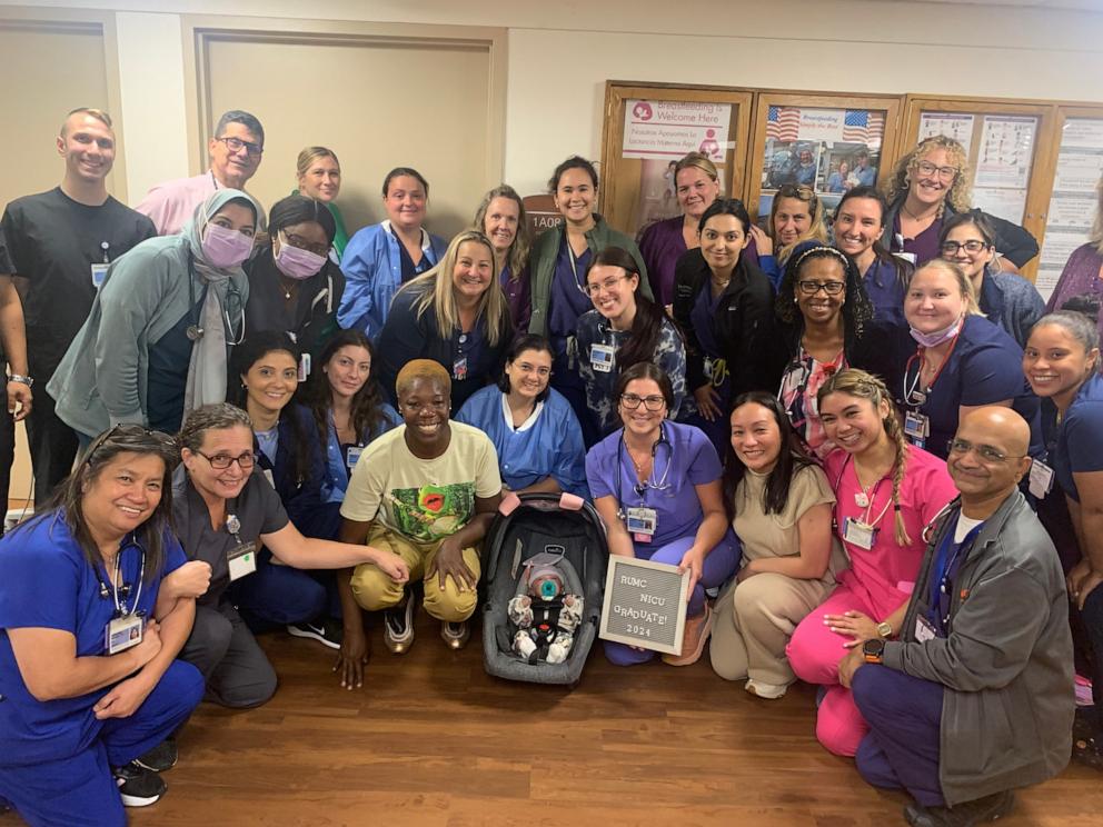 PHOTO: Tiffany Murray and her daughter Miracle pose for a photo with staffers at Richmond University Medical Center in Staten Island, New York on Aug, 21, when Miracle was discharged from the neonatal intensive care unit.