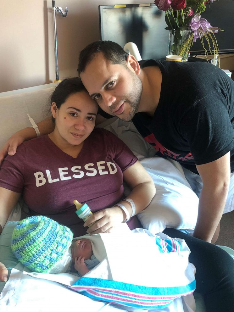 PHOTO: Maria Santa Maria poses on March 7, 2019, with her husband, Augusto and their son, Lucas. Lucas was born with exencephaly which means he is missing a large part of his skull.