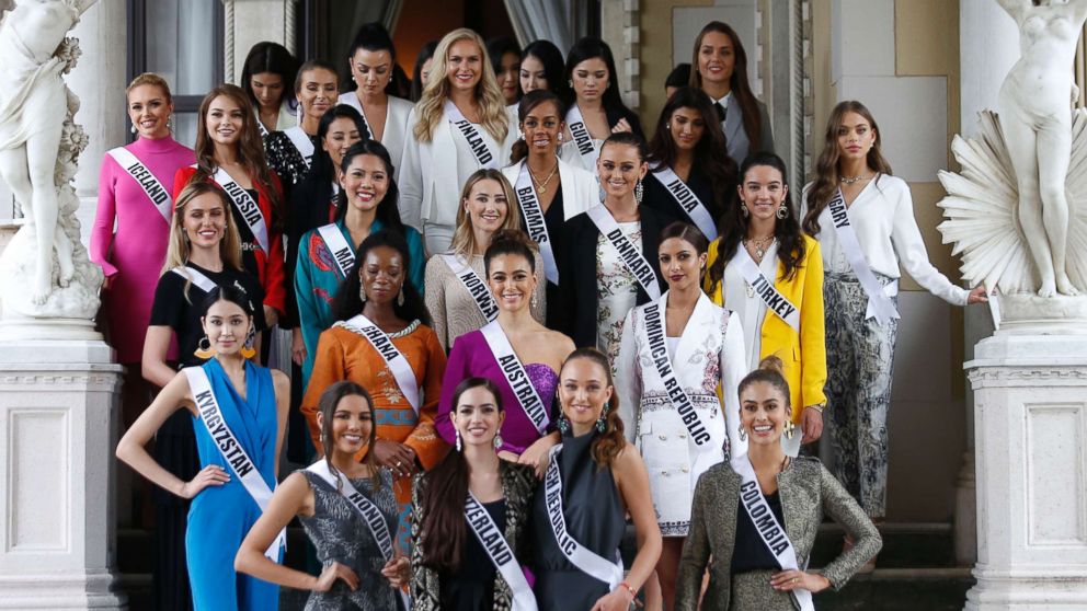 PHOTO: Miss Universe 2018 contestants pose for photos as the visit the Government House after their meeting with Thai Prime Minister in Bangkok on December 11, 2018. 