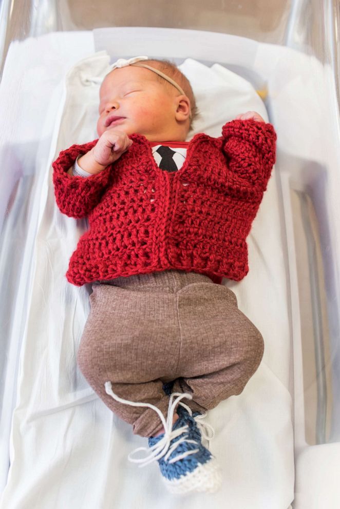 PHOTO: Newborns at UPMC Magee Womens Hospital don crocheted red sweaters and blue sneaker to honor Mister Rogers.