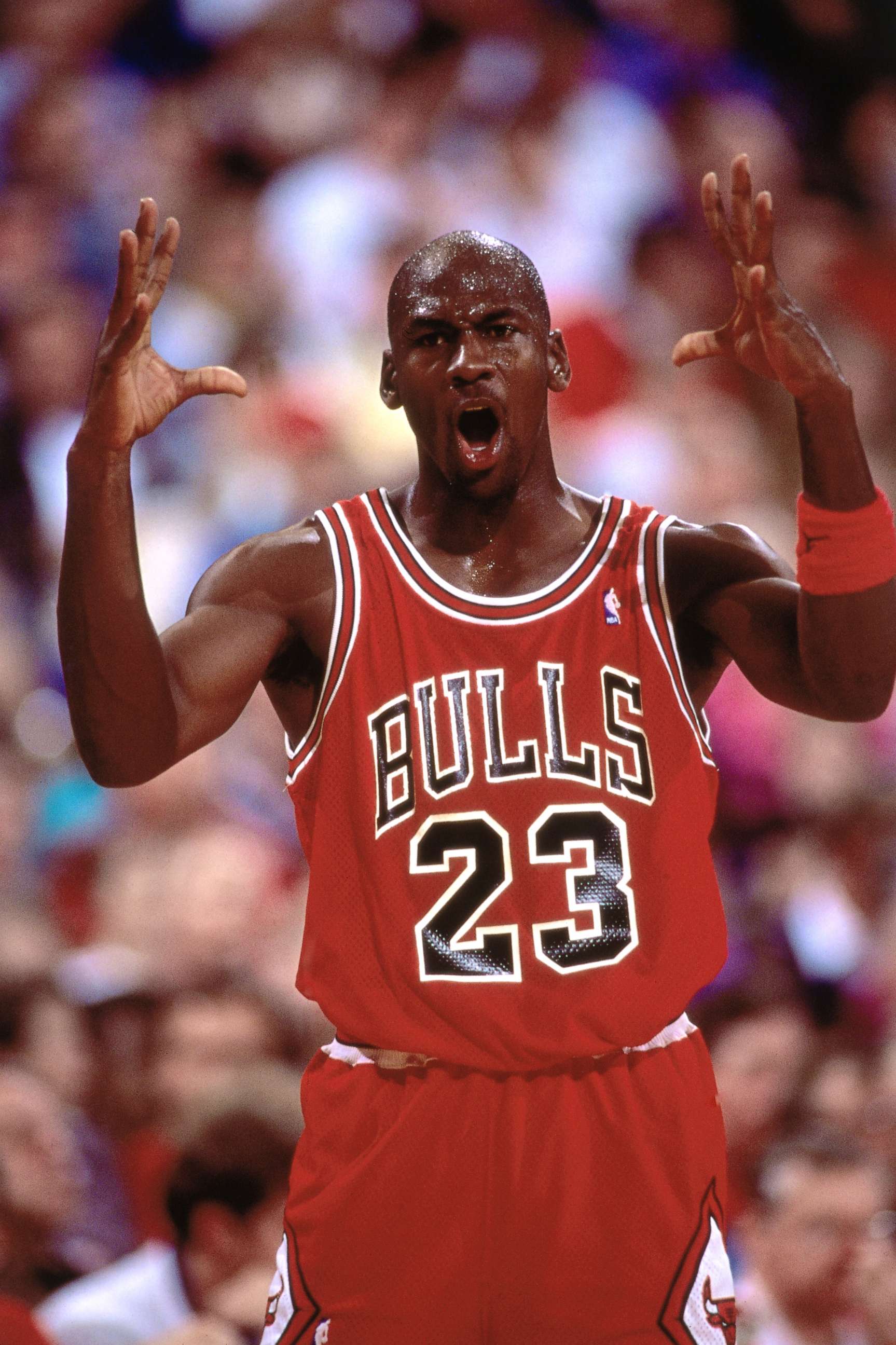 PHOTO: Michael Jordan #23 of the Chicago Bulls shows emotion against the Portland Trailblazers during a game played at the Veterans Memorial Coliseum in Portland, Ore., circa 1991.