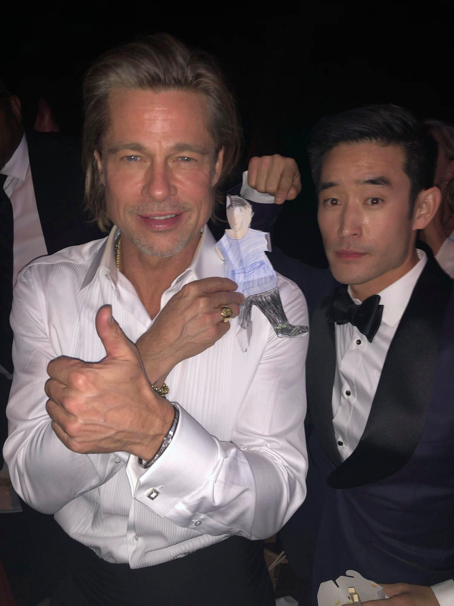 PHOTO: The Waunakee Community School District posted this photo of Brad Pitt with Mike Moh and Moh's son's 3rd grade project at the Screen Actors Guild Awards to their Facebook page.