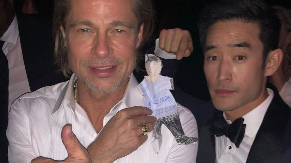VIDEO: Brad Pitt takes picture with co-star's son's self-portrait