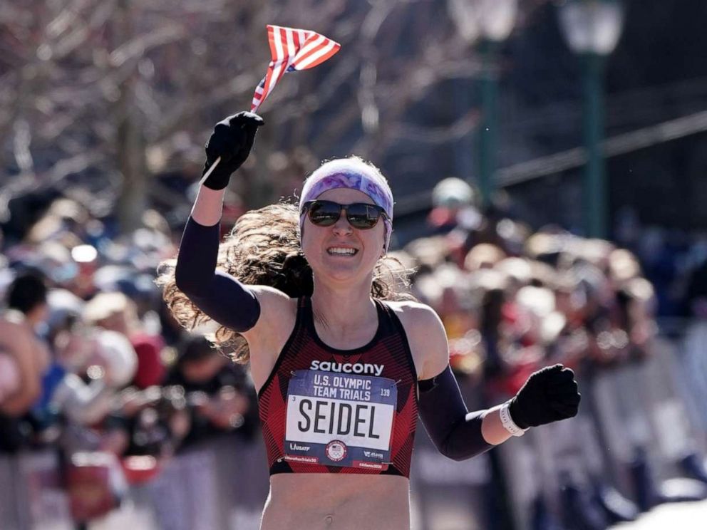 PHOTO: Molly Seidel celebrates after placing second in the women's race during the U.S. Olympic Team Trials marathon in Atlanta, Feb. 29, 2020.