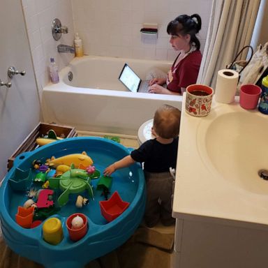 Photo Of Mom Working In Bathtub Leads, How To Keep Toddler From Turning On Bathtub
