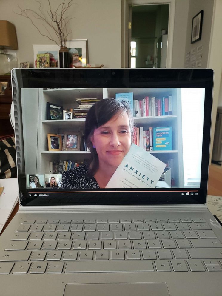 PHOTO: Heidi Metcalf Lewis of Silver, Spring, Maryland, is seen holding a book discussion from her living room, May 2020.