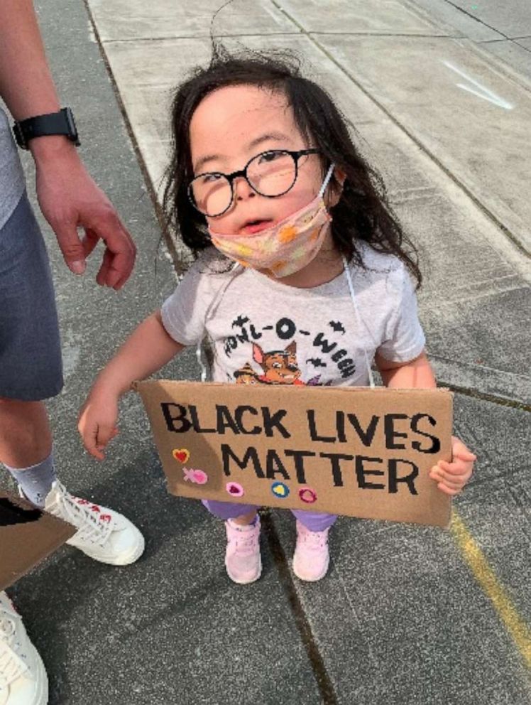 PHOTO: Ruby Park, 5, of Seattle, Washington, hols a Black Lives Matter sign.