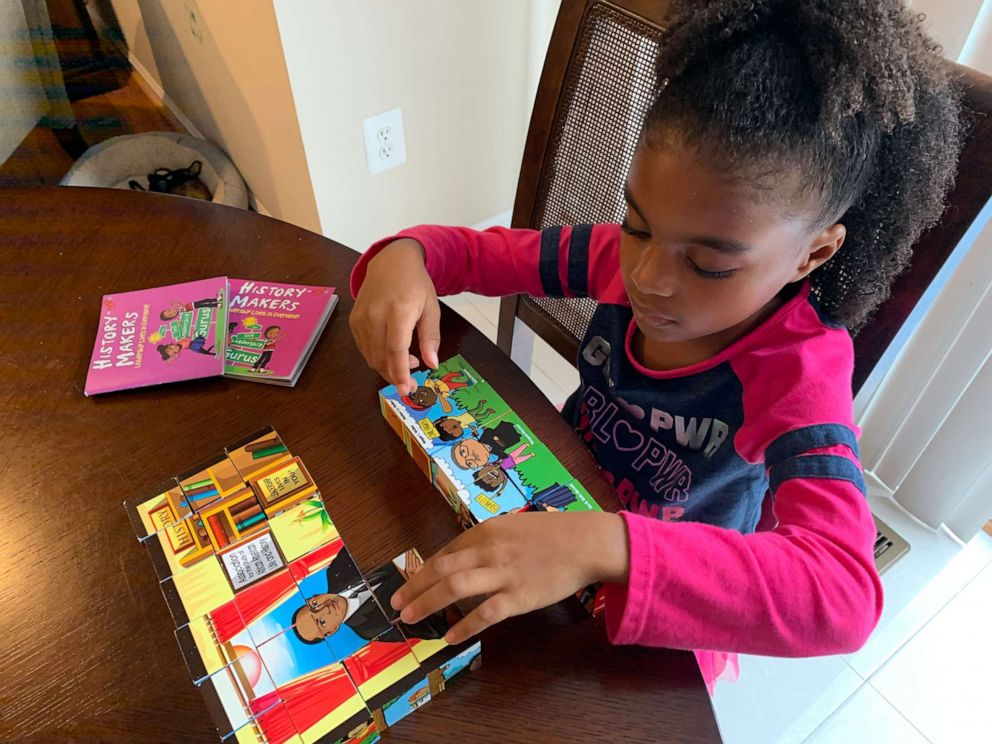 PHOTO: Tiffney Laing of Ashburn, Virginia, launched Bevy and Dave in hopes to help parents and educators explore Black history through the lens of leadership. Here in this photo, Laing's daughter Beverly plays with the wooden block set.