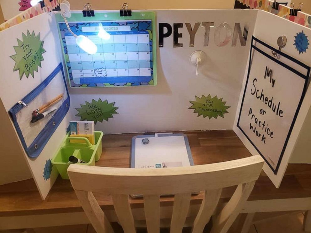 PHOTO: Angelina Harper, a special education teacher from Louisville, Kentucky, crafted work stations for each of her children, Aubrie, 8 and twins Paige and Peyton, 6. Seen in this photograph is Peyton's learn-from-home station.