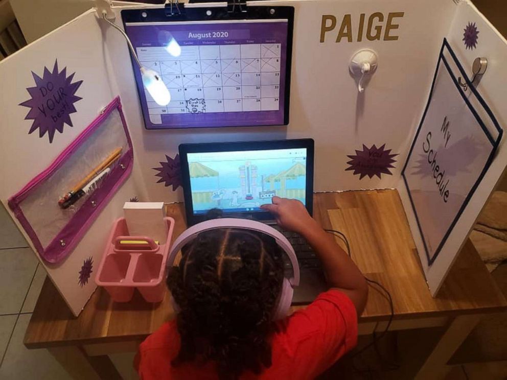 PHOTO: Angelina Harper, a special education teacher from Louisville, Kentucky, crafted work stations for each of her children, Aubrie, 8 and twins Paige and Peyton, 6.