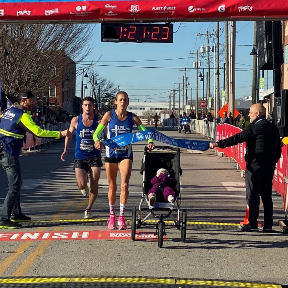 VIDEO: Mom sets likely world record for half marathon while pushing a stroller