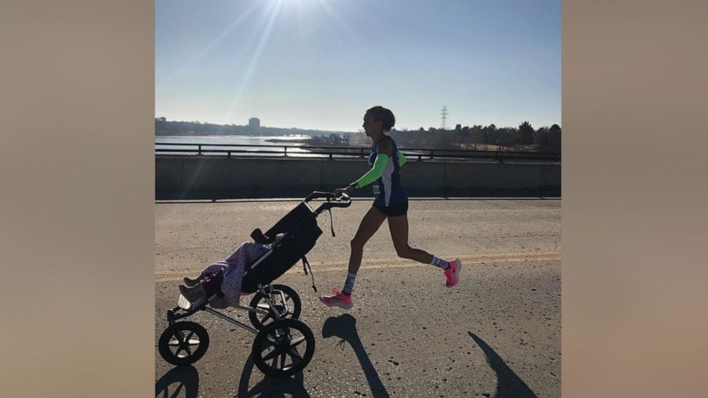 PHOTO: Julia Webb won the female division of the 2019 Route 66 Half-Marathon while pushing her 10-month-old daughter Gabby in a stroller.