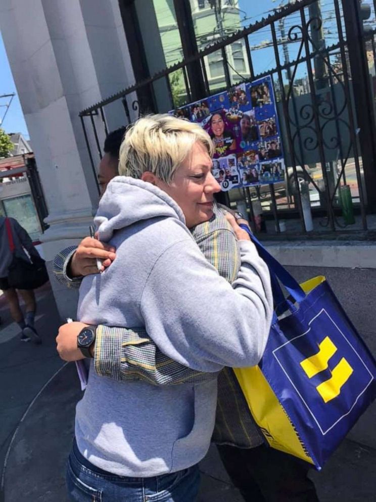 PHOTO: Sara Cunnningham of Oklahoma City, Oklahoma, launched Free Mom Hugs, a group of affirming parents and allies who love the LGBTQ+ community unconditionally, in 2016. She also stnads in for parents of gay couples at weddings. 