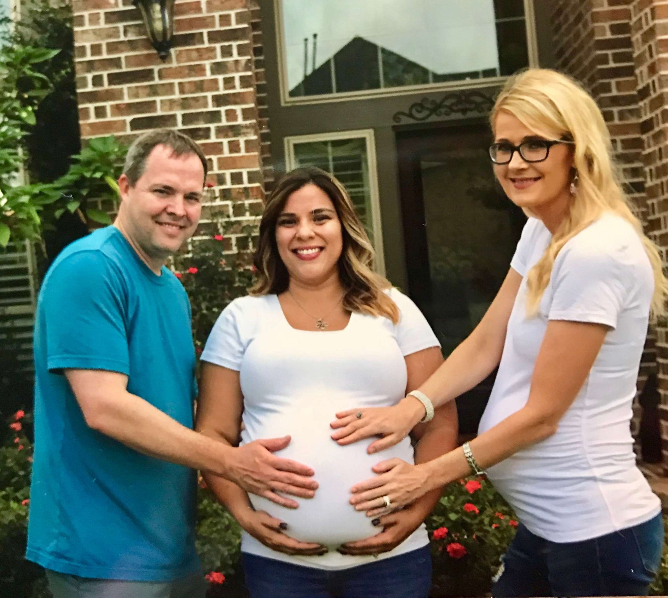 PHOTO: James and Andrea Valentine pose with their neighbor and surrogate, Tawnee Gonzalez of Cypress, Texas. 