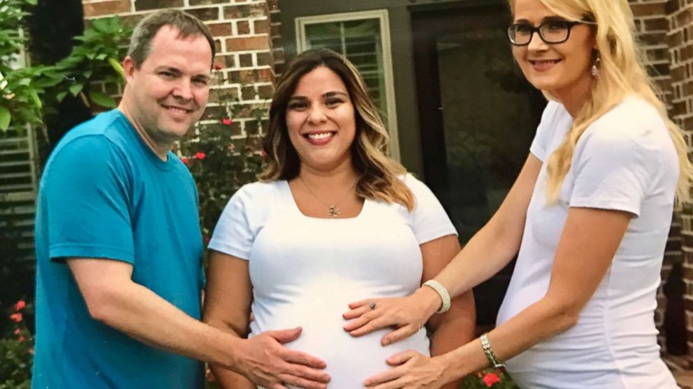 PHOTO: James and Andrea Valentine pose with their neighbor and surrogate, Tawnee Gonzalez of Cypress, Texas. 