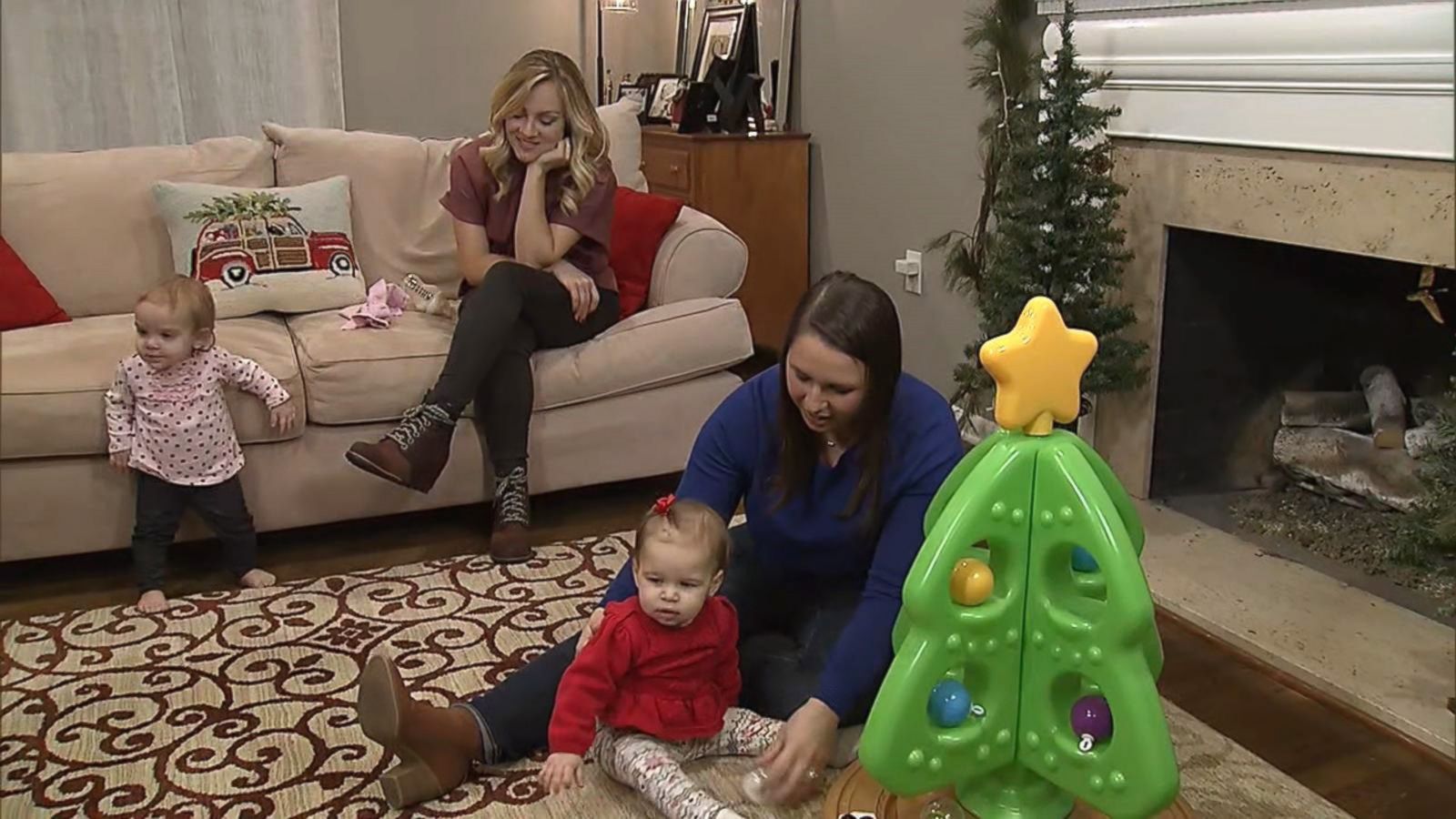 PHOTO: Kelly Brennan, left, and Susie Schmitt, both of Pittsburgh, play with their young daughters.