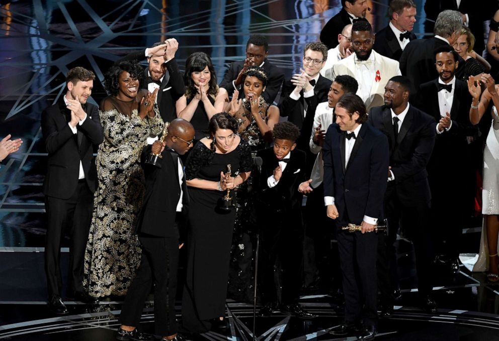 PHOTO: Cast and crew of 'Moonlight' accept the best picture award onstage during the 89th annual Academy Awards, Feb. 26, 2017, in Hollywood, Calif.