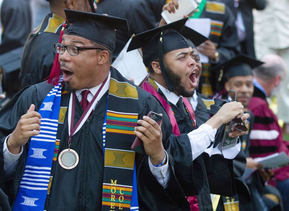 PHOTO: Graduates react after hearing billionaire technology investor and philanthropist Robert F. Smith say he will provide grants to wipe out the student debt of the entire 2019 graduating class at Morehouse College in Atlanta, May 19, 2019.