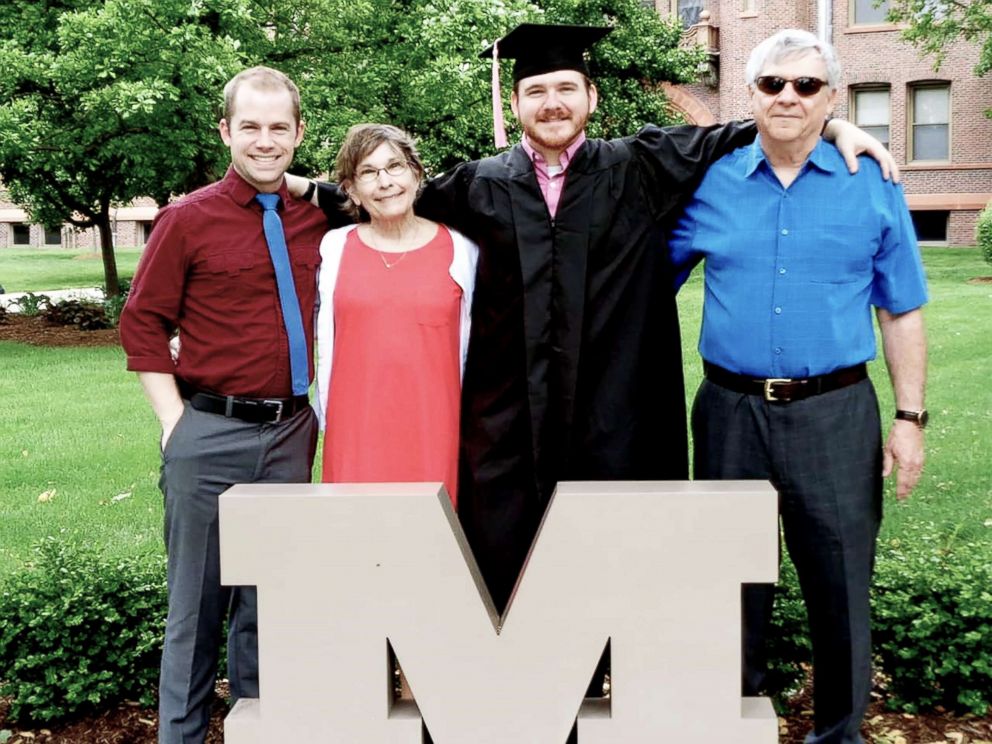 PHOTO: Morgan Bothwell, center, poses at his graduation with his brother, PJ Rudoi, far left, and parents, Leslie and Jim Bothwell.