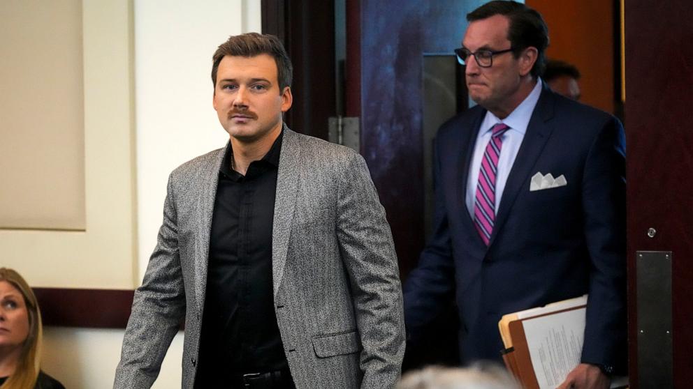 PHOTO: Morgan Wallen, left, enters a courtroom to plea guilty to reckless endangerment charges related to throwing a chair off a six-story balcony on Dec. 12, 2024, in Nashville, Tenn. 