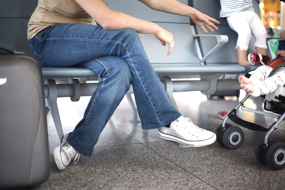 PHOTO: A mother and son are pictured at an airport in this undated stock photo.