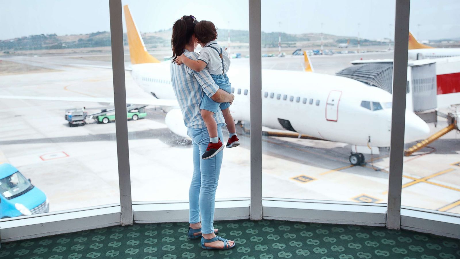 PHOTO: A mother and son are pictured at an airport in this undated stock photo.