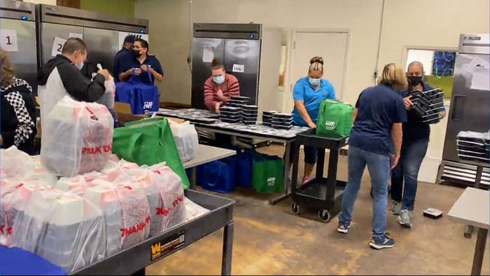 PHOTO: Volunteers and staff prepare meals for delivery in San Antonio, Texas.