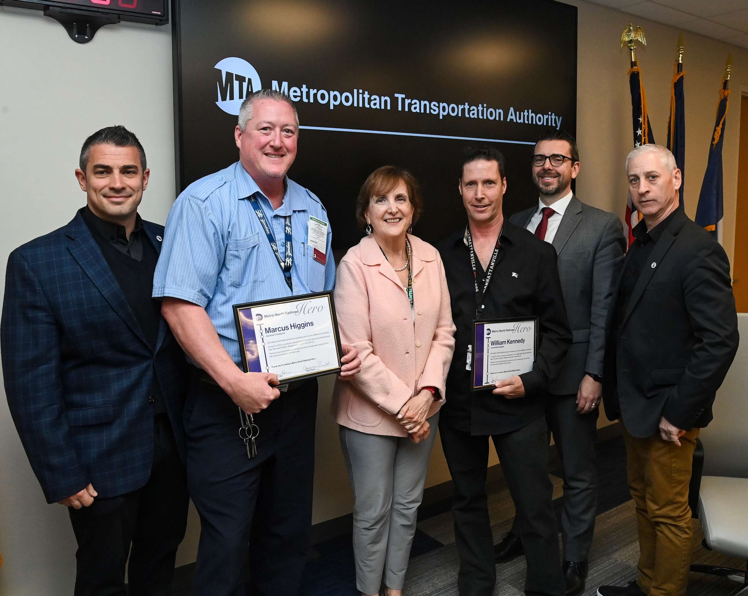 PHOTO: Metro-North President and Long Island Rail Road Interim President Catherine Rinaldi, center, poses for a photo after awarding commendations, April 25, 2023, to five employees involved in a daring rescue of a three-year-old boy.