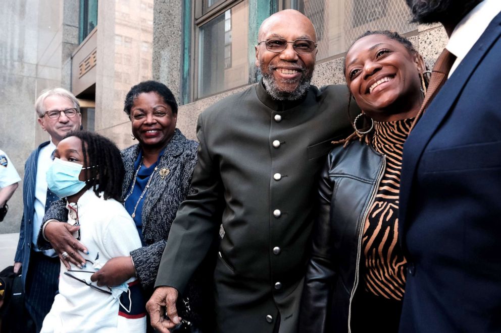 PHOTO: Muhammad Aziz stands outside of a New York City courthouse with members of his family and lawyers after his conviction in the killing of Malcolm X was thrown out on Nov. 18, 2021 in New York City. 