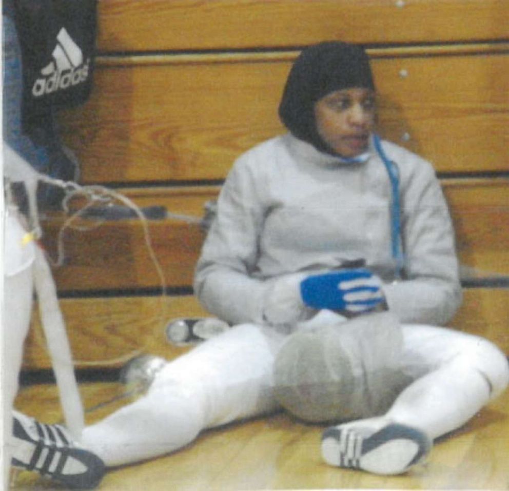 PHOTO: Ibtihaj Muhammad takes a break during fencing practice as a teenager.
