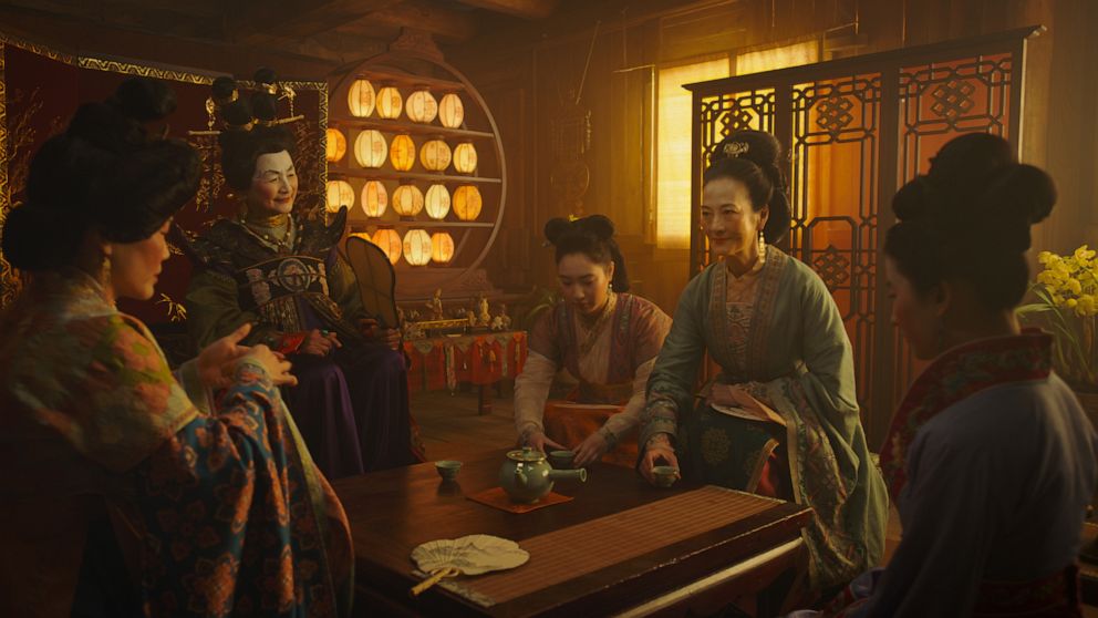 PHOTO: Matchmaker (Pei-Pei Cheng), Xiu (Xana Tang), Wuwei (Rosalind Chao) and Mulan (Yifei Liu)appear in this scene from Walt Disney's MULAN.